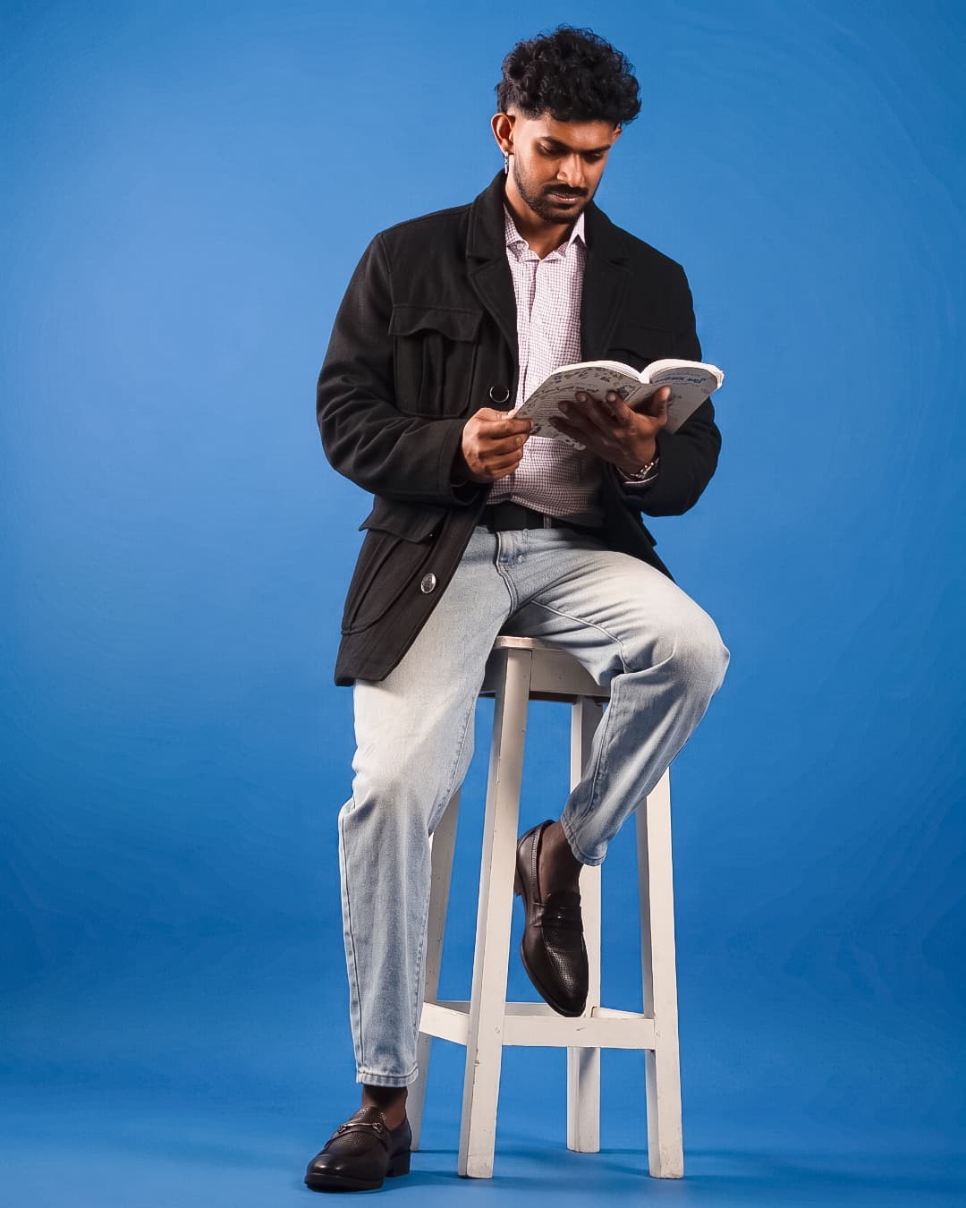 The Galle Penny Loafer worn with a relaxed blue studio look